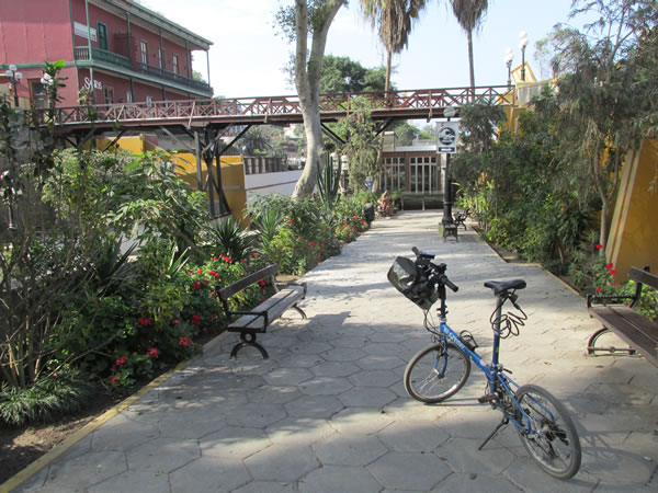 Ted’s bike near old wooden bridge in Barranco district of Lima, Peru.