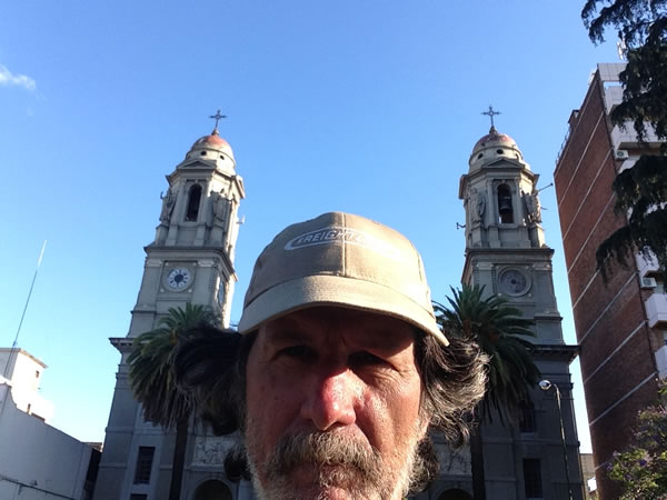 Ted in front of church on main square of Mercedes, Uruguay.