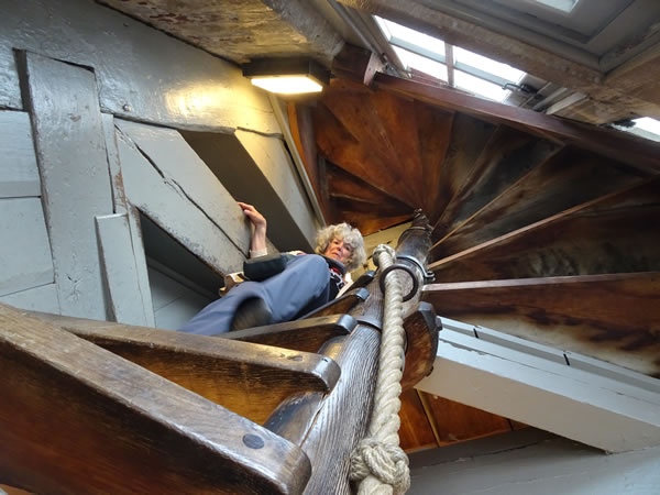 Belgium – Nancy going down the stairs of the Bell tower in Bruges.