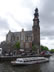 Amsterdam – Church with canal tour boat