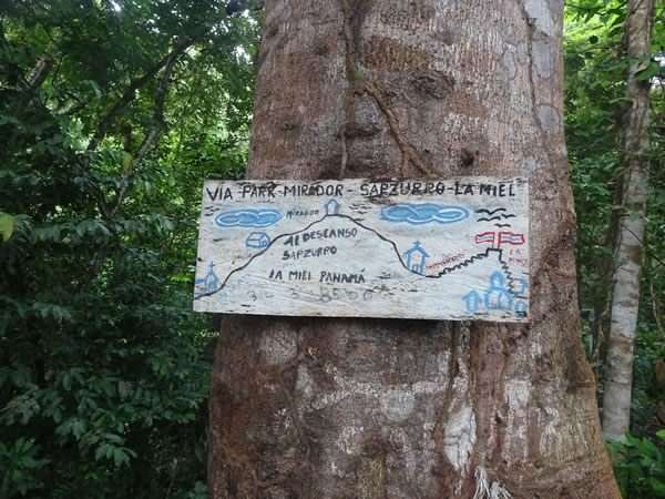 Trail sign for Capurgana, Colombia to La Miel, Panama hike.