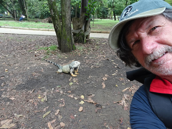 Ted with iguana at Botanical garden in Medellin, Colombia.