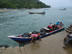 A boat with our gear arriving in Capurgana, Colombia.