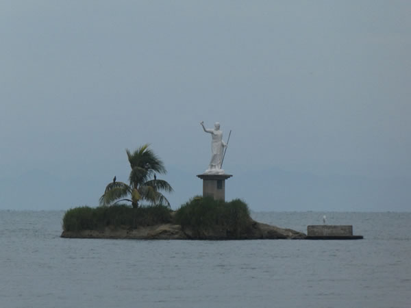 The God of the Sea Statue near Livingston, Guatemala.
