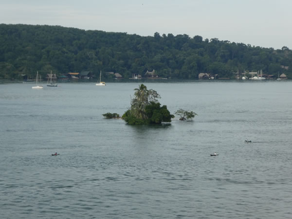 View of small island seen from bridge near Rio Dulce, Guatemala.