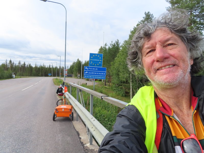 Ted with his bike at the Sweden boarder near Kolari, Finland.