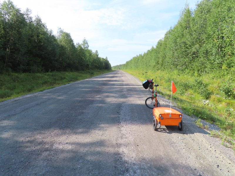 Teds bike on dirt road in Sweden, just north of Artic Circle.