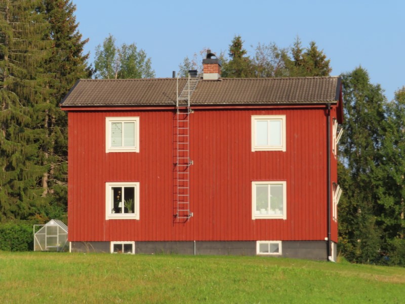House south of Fllfors, Sweden. Another home with ladders connected to the roof for cleaning the chimneys.