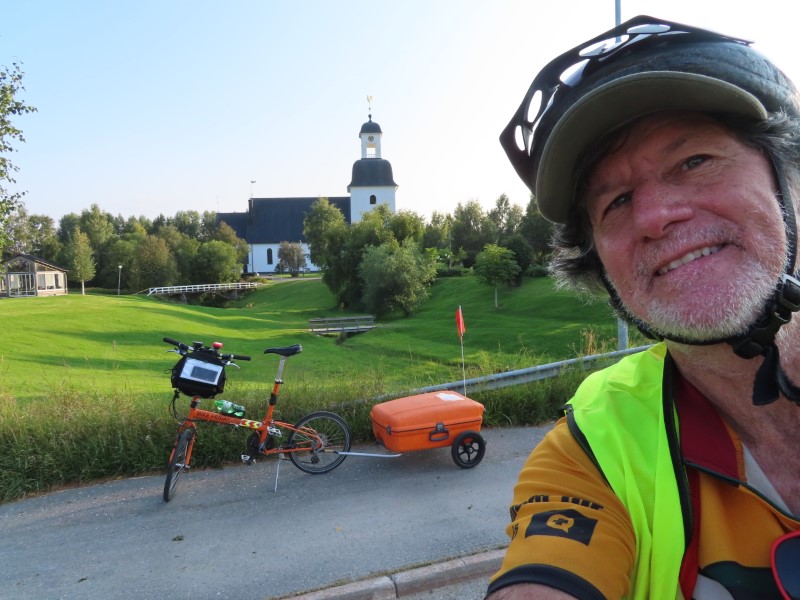 Ted with his bike near church that is between Fllfors, Sweden and Kge, Sweden.