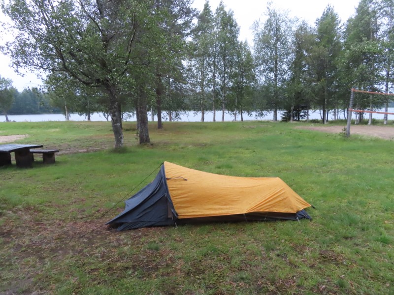 Teds tent set up in front of changing room at Sanabadets campground in Sweden.  He did not sleep in the tent.  It was set up due to mosquitoes.  However, the Mosquitoes where not in the changing room and it was dry in the changing room.  So Ted slept in the changing room.  It was a rainy night, best not in the tent.