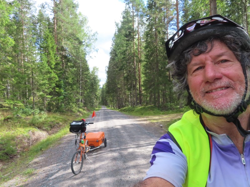 Ted with his bike on roads between Ullnger, Sweden and Bjrtr, Sweden.