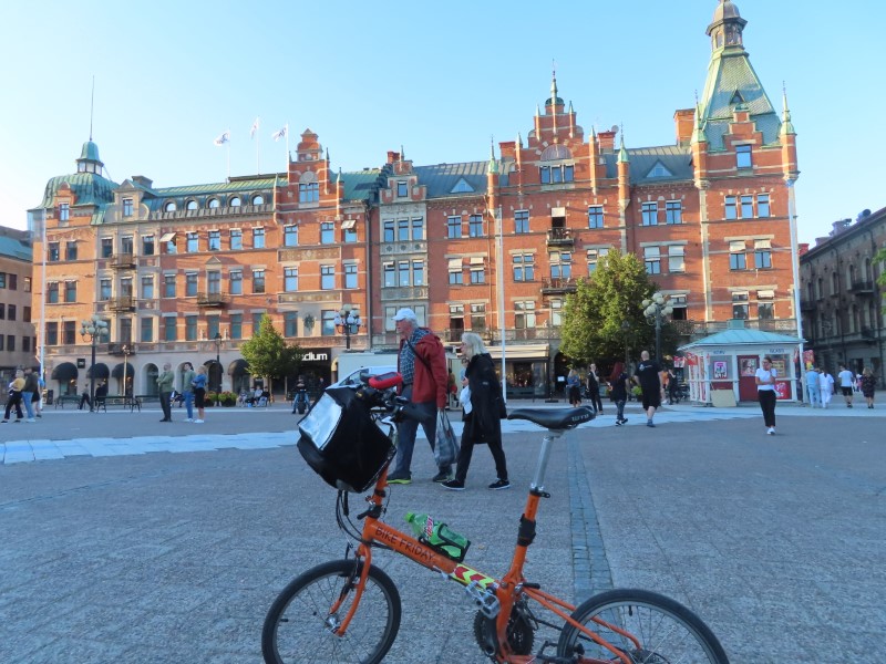 Ted’s bike with building in main square of Sundsvall, Sweden.