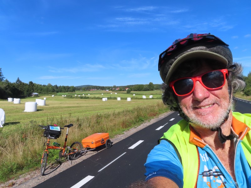 Ted with his bike on road between Iggesund, Sweden and Kllene, Sweden.