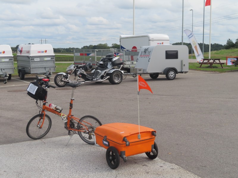 Ted's bike near Motorcycle pulling a camper trailer in Sweden.