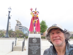 Ted next to statue at Mardi Gras Park in Mobile, Alabama.