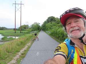 Ted and his bike on the Cape Code Rails to Trails in Massachusetts.
