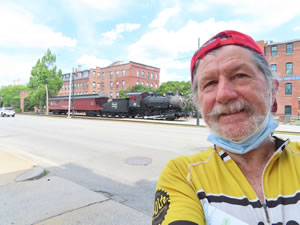 Ted with historic Boston to Maine railroad steam locomotive No. 410 in the background in Lowell, Massachusetts.