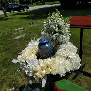 Aunt Shirley’s ashes on top of where they will be buried at St. Mary’s Cemetery in Tewksbury, Massachusetts.