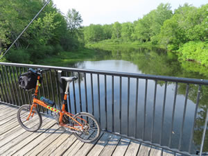 Bridge on Cheshire Rails Trail with Ted’s bike west of Keene, New Hampshire.