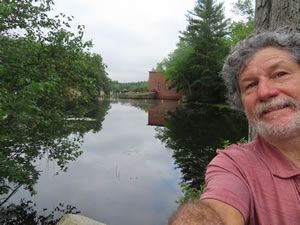 Ted with gatehouse in background at Mine Falls Park, Nashua, New Hampshire.