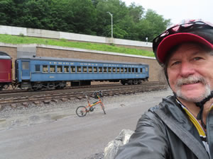 Ted and his bike near D & L trail with scenic train to Jim Thorpe, Pennsylvania.