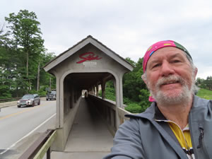 Ted near covered walk on bridge in the town of Stowe, Vermont.