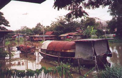 A houseboat on a river a little north of Bangkok, Thailand.