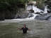 Ted in the water near waterfall by Minca, Colombia.