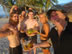Ted drinking coconut drink on a single family San Blas Island, Panama with San Blas Adventure team members. (first night) 