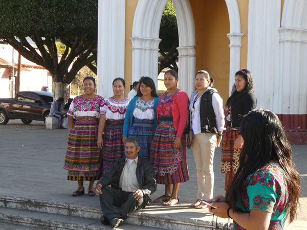 A man in photo with ladies at previous photo's church near Antigua, Guatemala.