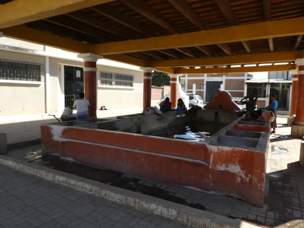 Manual Laundromat (cement scrub boards) near Chimaltenango, Guatemala.