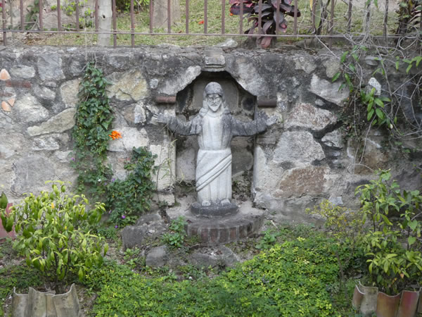 Statue in church garden in Antigua, Guatemala.