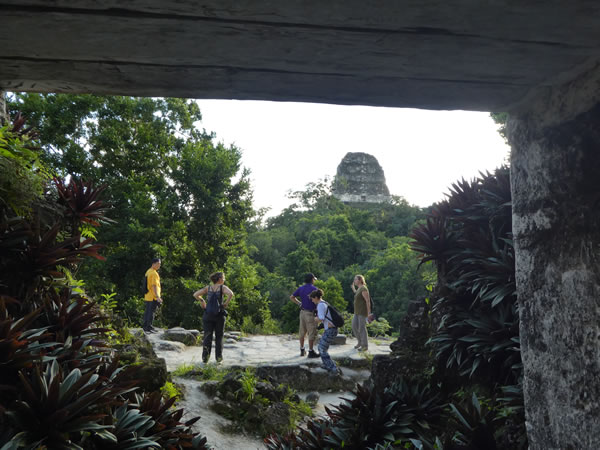 People on ruins at Tikal National Park, Guatemala.