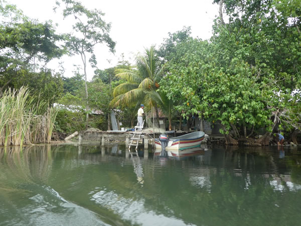 Home on the shore of the Rio Dulce between the town of Rio Dulce and Livingston, Guatemala.