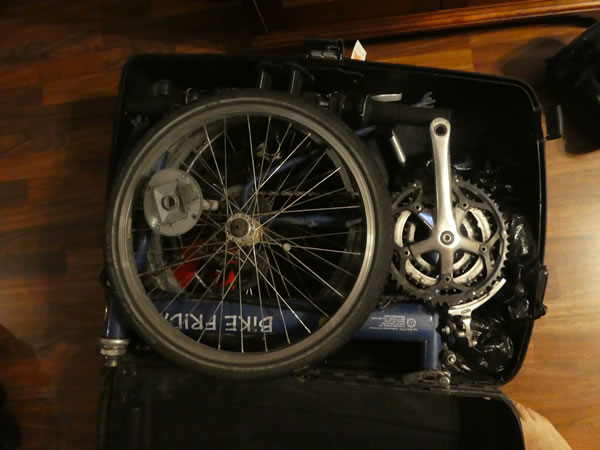 Ted’s bike packed in his Samsonite suit case for his flight back to Portland, Oregon.