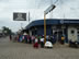People waiting to go into the bank at El Estor, Guatemala. (lines like this are common at Latin American banks)