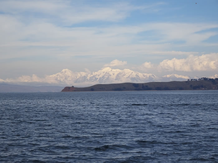 Snow covered mountains seen from Lake Titicaca near Copacabana, Bolivia 