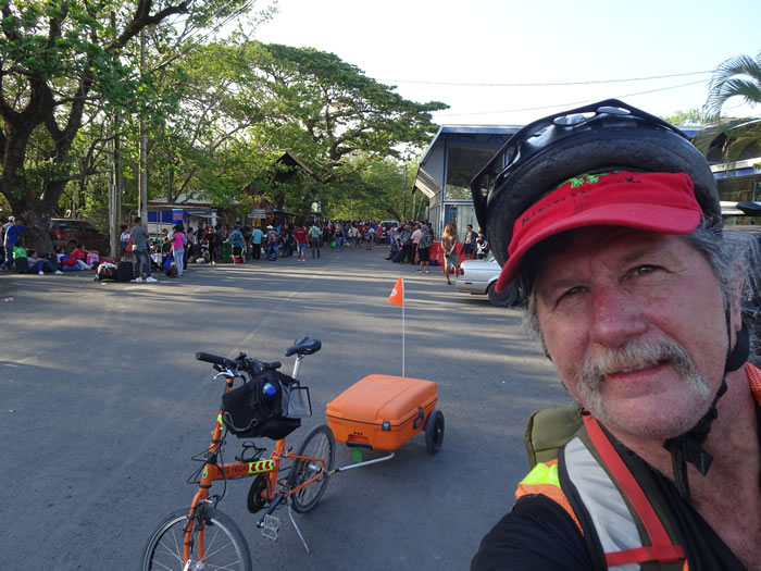 Ted with his bike in Costa Rica with the boarder from Nicaragua behind him – took 5 hours to get to this point.