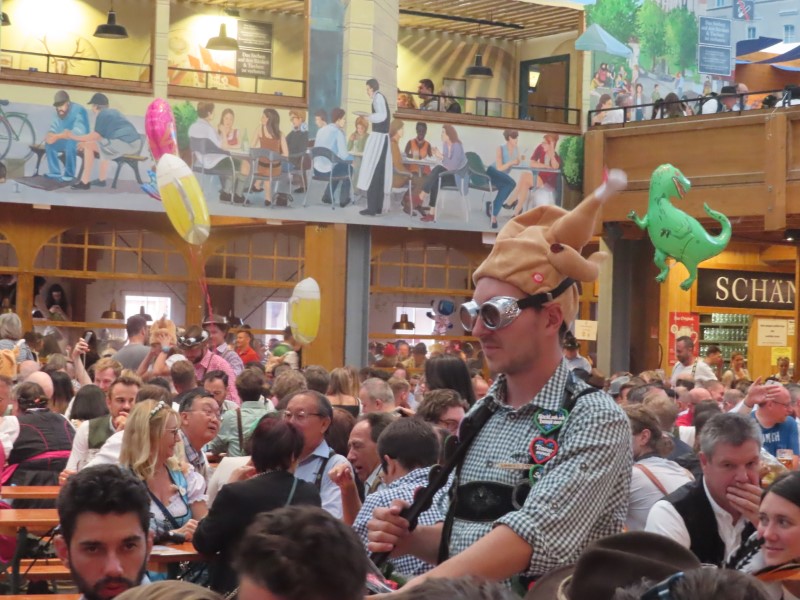 People in beer hall at Oktoberfest in Munich, Germany.