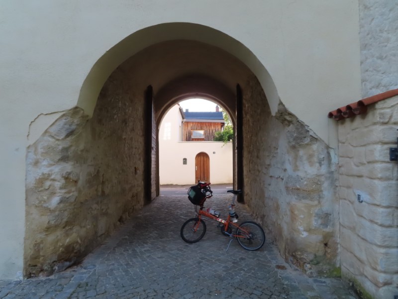 Ted's bike in gate hall to town next to Hotel Fronfeste (Prison converted into hotel) in Amberg, Germany.