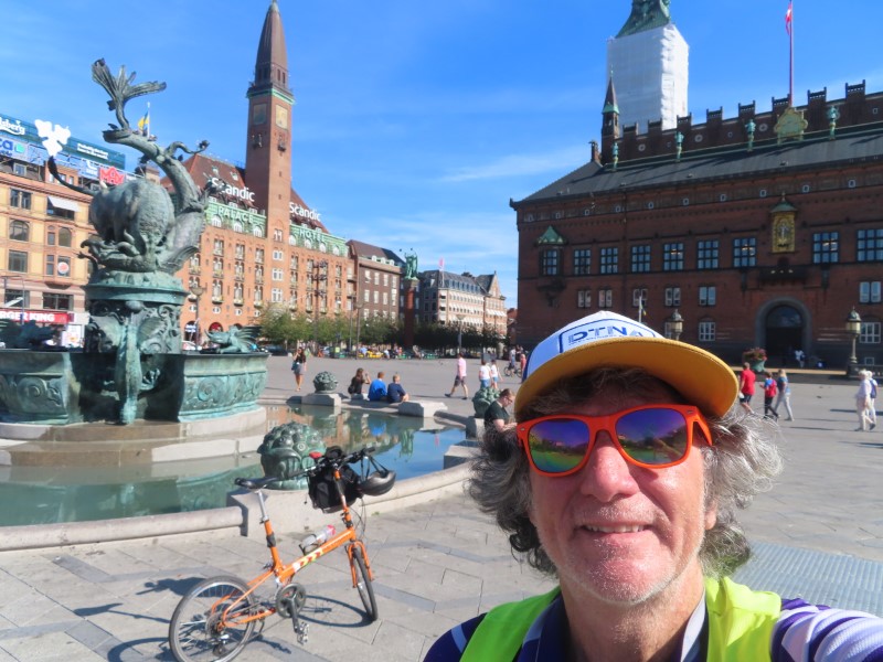 Ted with his bike near statue in Copenhagen, Denmark. 