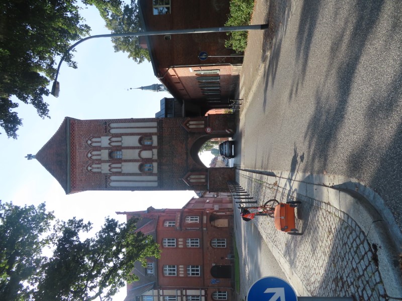 Ted's bike and path trough building into the town of Wittstock, Germany.