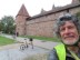 Ted with his bike in front of old town's surrounding wall  in Nuremberg, Germany.